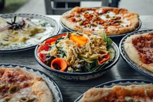 A vibrant spread of Mexican and Italian dishes, perfect for a delicious meal.